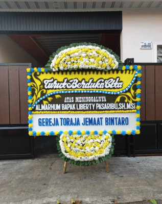 Papan Bunga Duka di Bobo